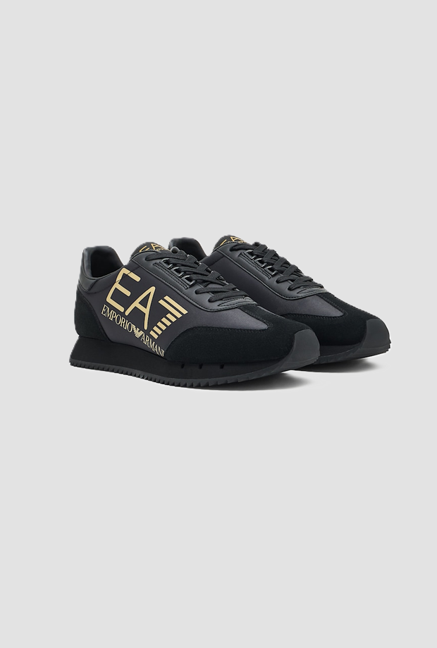 Scarpe con maxi logo in oro da uomo nero 